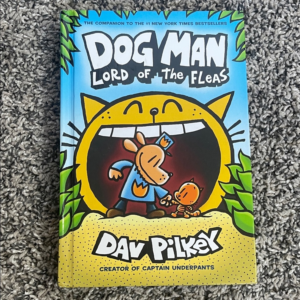 Kids book Dog Man Lord of the Fleas by Dav Pilkey comic book style scholastic